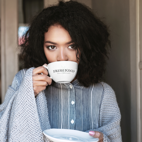 products/24-oz-mug-mockup-of-a-woman-drinking-tea-at-home-38274-r-el2.png